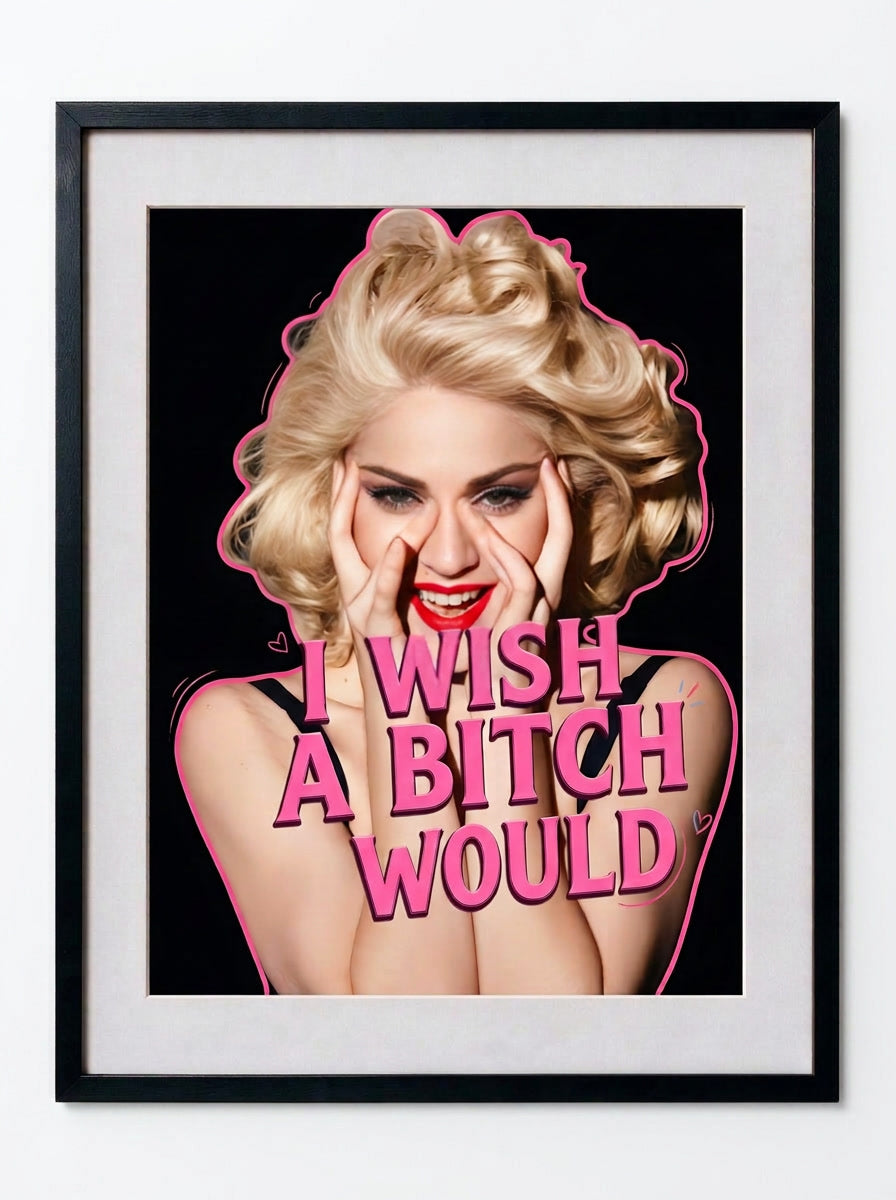 Framed pop-art style poster featuring a blonde woman with red lipstick and bold pink text reading 'I WISH A BITCH WOULD' on a black background, shown in a black frame with white mat.
